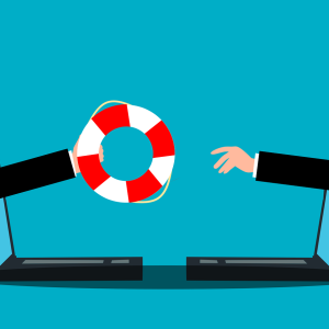 Hand som sträcker livboj ur en dator till en annan