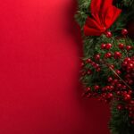 Christmas wreath at red background