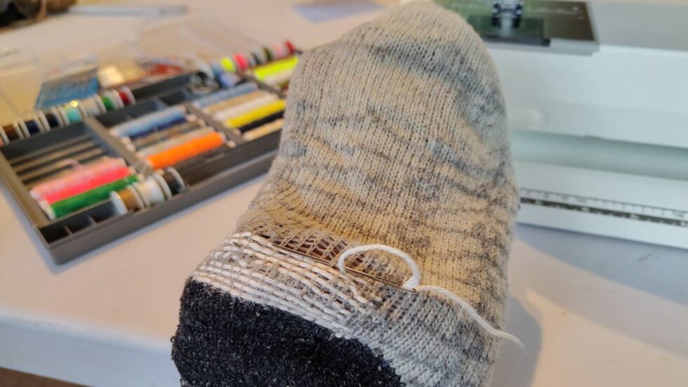 Lagning av socka med hjälp av symaskin