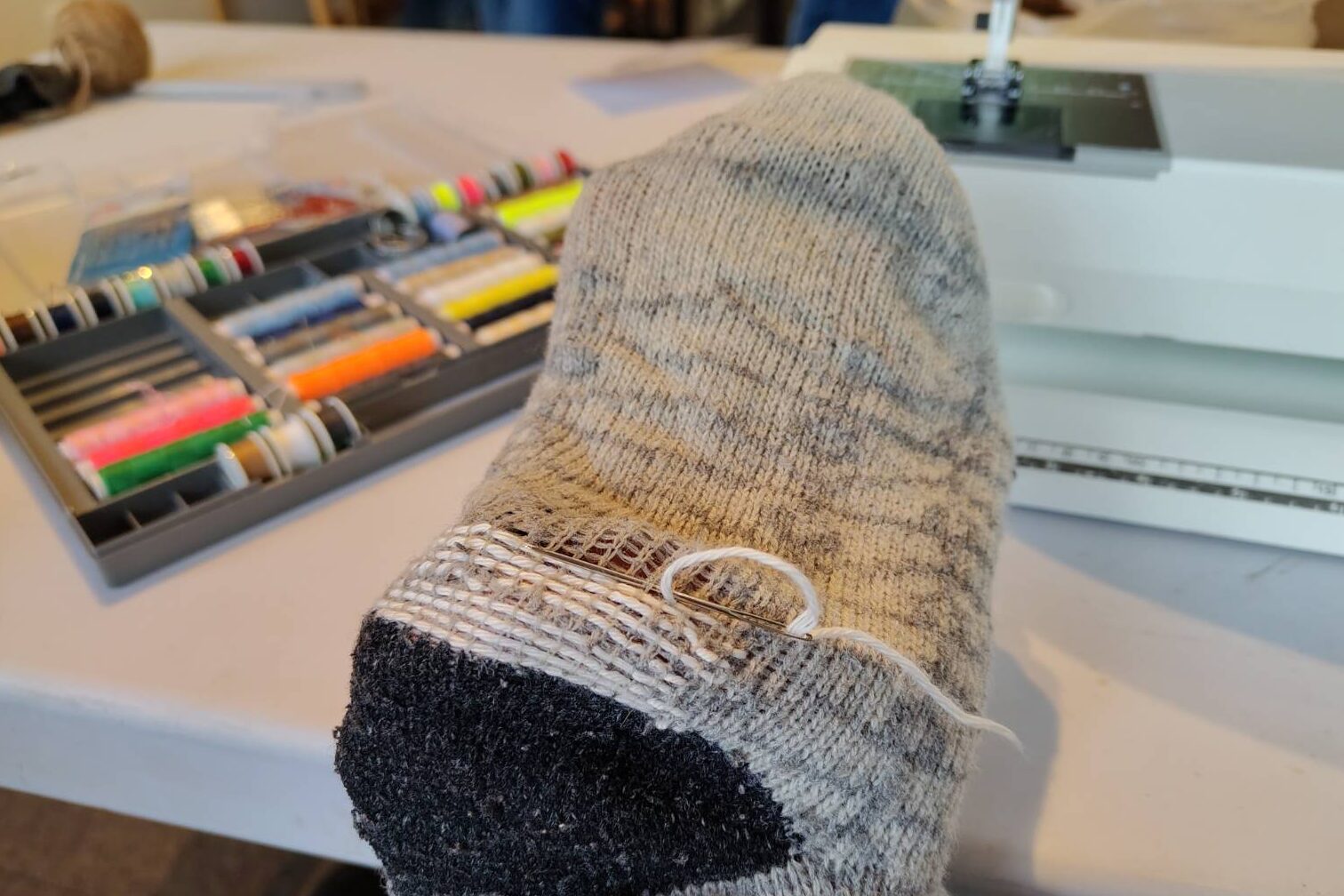 Lagning av socka med hjälp av symaskin